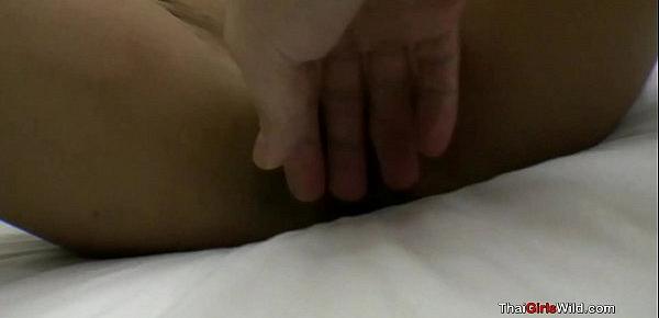  Curly hairded Thai hooker stuff a big cock in her little cunt